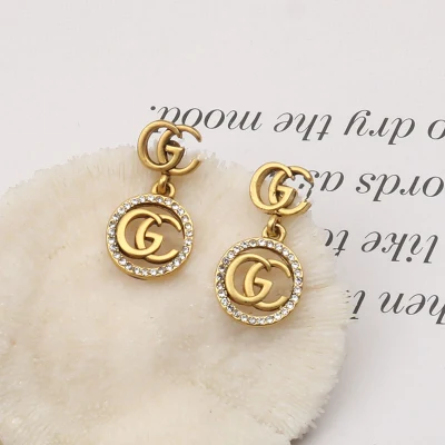 Großhandel Luxusschmuck Berühmte Marke Ohrstecker Gucci′ S Gg Damen inspirierte Designer-Ohrringe Beliebte Marken-Creolen